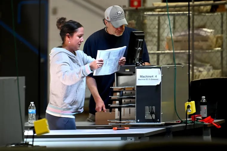 Philadelphia City Commission elections workers begin the recount at the Philadelphia Ballot Processing Center May 29, 2022 in the Pennsylvania Republican Senate primary between candidates Mehmet Oz and David McCormick.