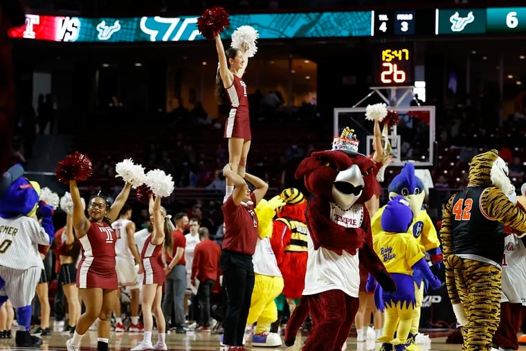 The Temple Owls mascot Hooter celebrates its birthday with other mascots from the area. Five different people play the role of Hooter.