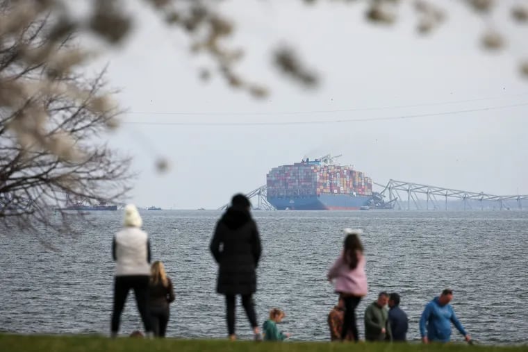 A view from Fort McHenry of the Francis Scott Key Bridge after a container ship slammed into it on the Patapsco River in Baltimore, Maryland on Tuesday, March 26, 2024.